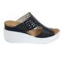 Women's blue leather sandals with perforation on white platforms