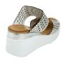 Women's silver leather sandals with perforation on white platforms