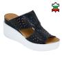 Women's blue leather sandals with perforation on white platforms