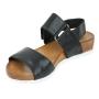 Women's black leather sandals with brown platforms and white soles and velcro