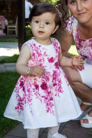 Children dress in white with flowers